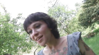 Tattooed milf with small tits gets spitroasted outdoors